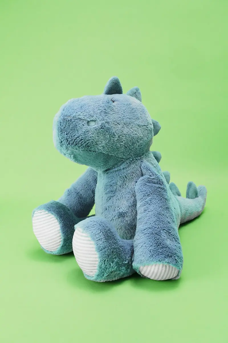 Peluche Dino em poliéster · Bebé · Creme