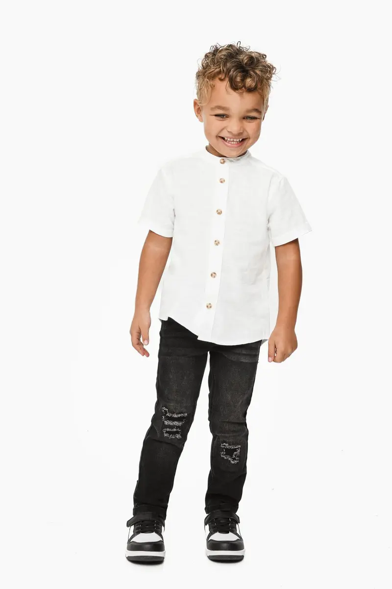 Calças de ganga skinny · Menino