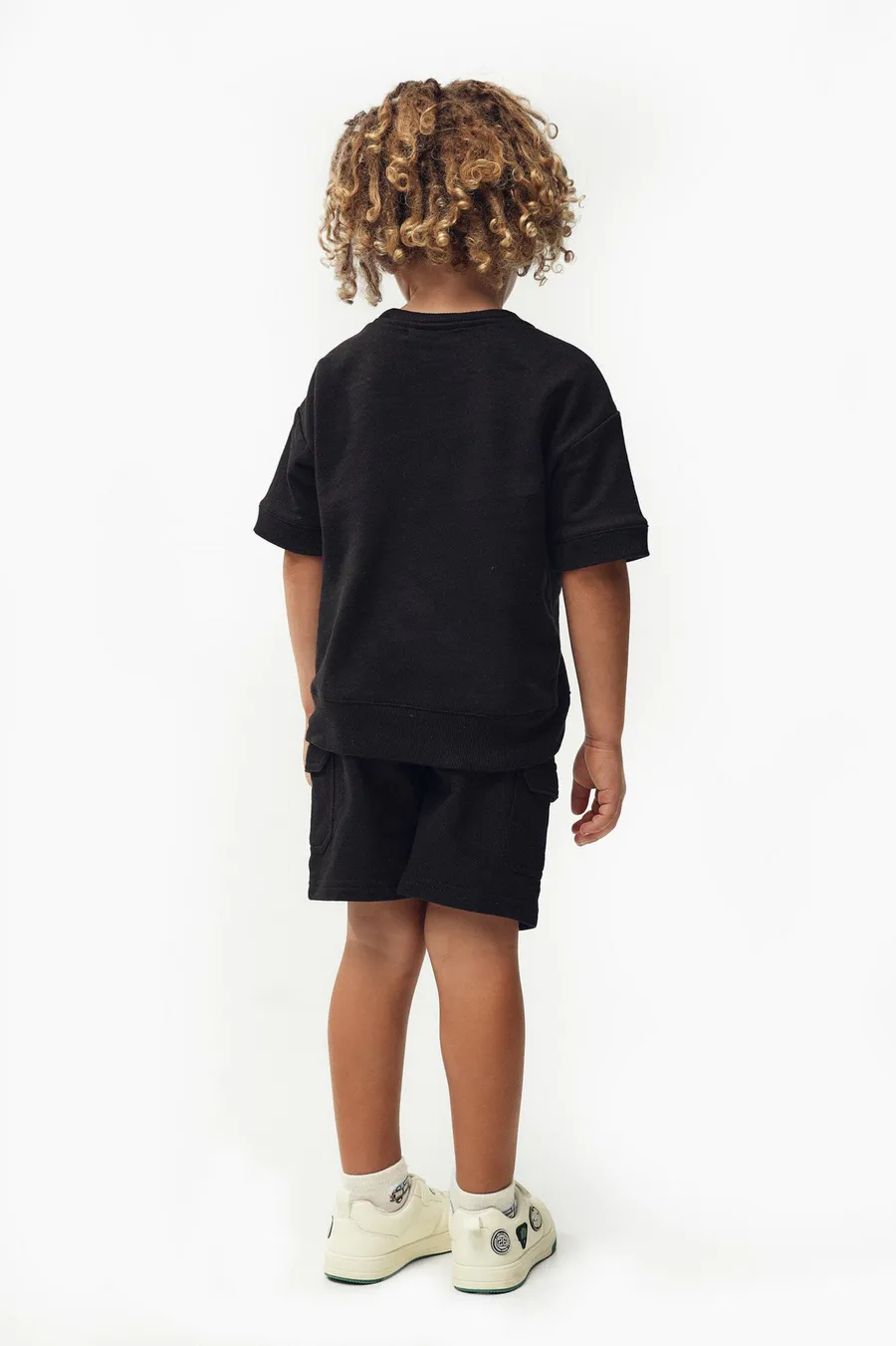 T-shirt Boxy em algodão · Menino · Preto