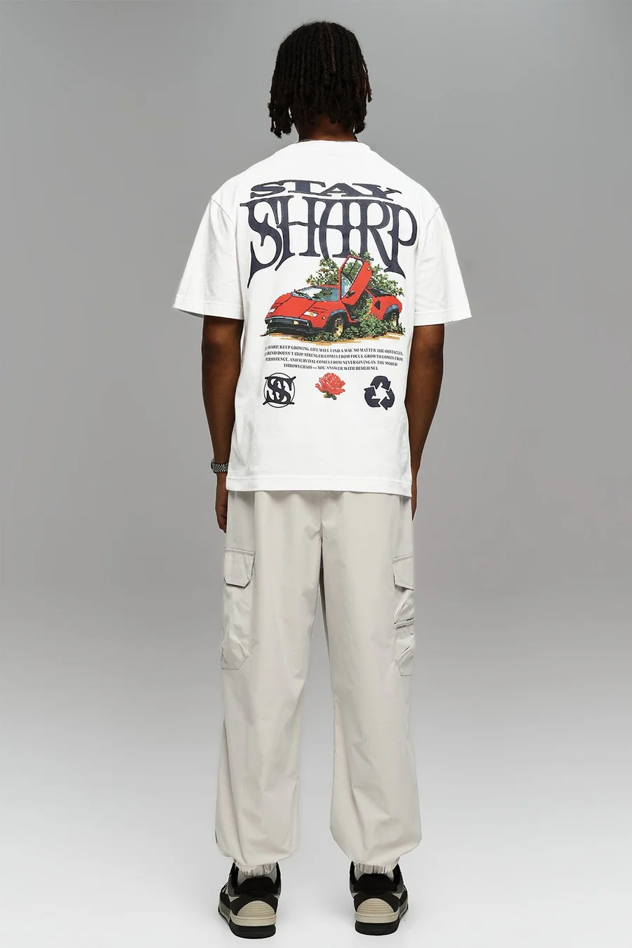 Calças jogger em poliéster · Homem · Creme