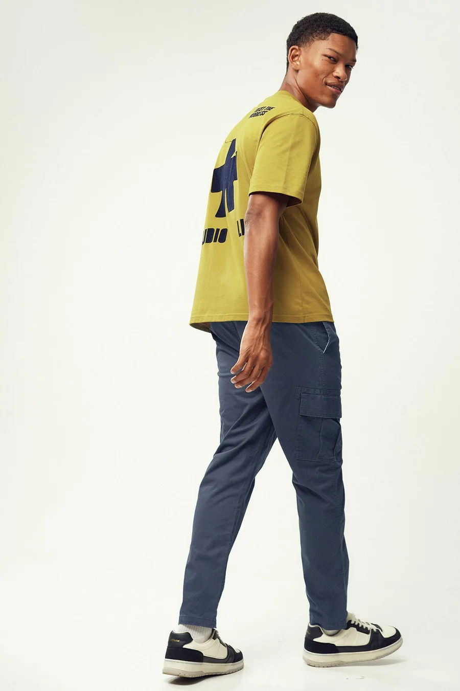 Calças Tapered em algodão · Homem · Azul