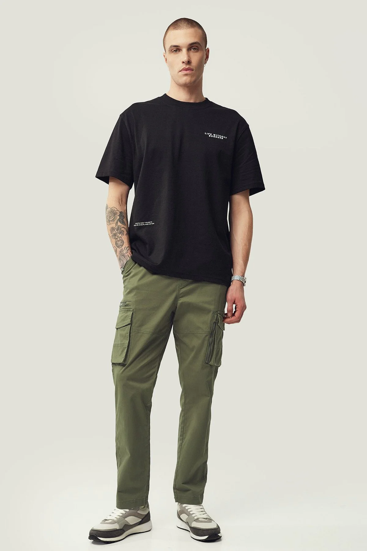 Calças Tapered em algodão · Homem · Verde Oliveira