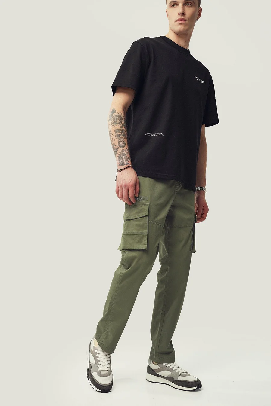 Calças Tapered em algodão · Homem · Verde Oliveira