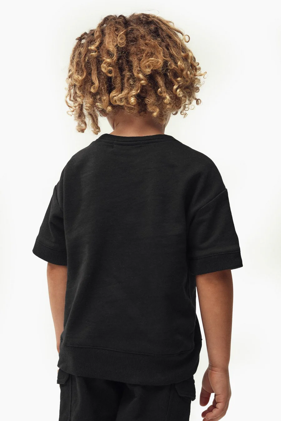 T-shirt Boxy em algodão · Menino · Preto